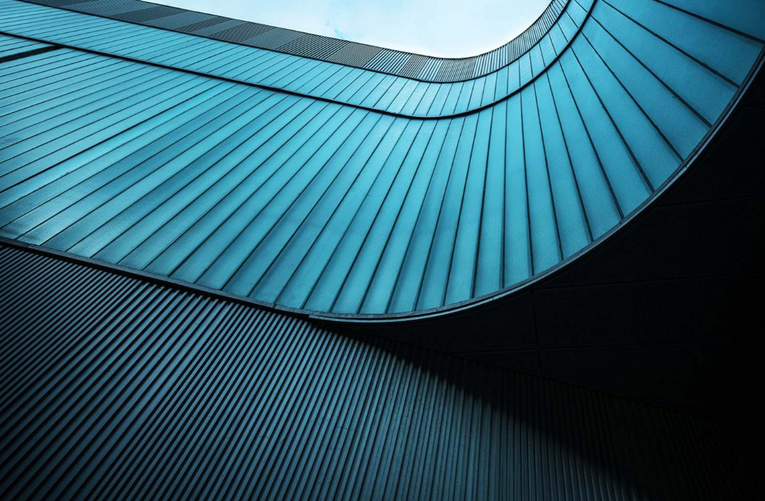 Abstract image looking up the side of building